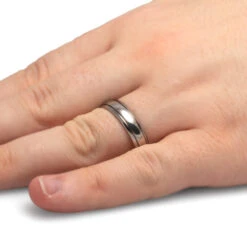 Titanium Wedding Band With Grooved Pinstripes -Johan Jewelry Shop 1354Handshot