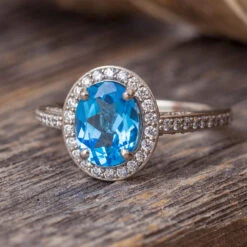Swiss Blue Topaz Engagement Ring With Diamond Halo