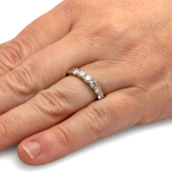 Custom Moissanite Wedding Band Styled In White Gold 13 Custom Moissanite Wedding Band Styled In White Gold -Johan Jewelry Shop 2971 Handshot