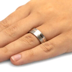 Solid Gold Wedding Band With Brushed Titanium Accents 13 Solid Gold Wedding Band With Brushed Titanium Accents -Johan Jewelry Shop 3705 Handshot