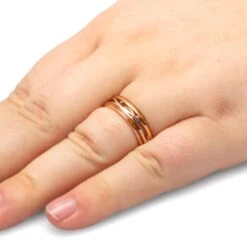 Swirling Gold Wedding Band With Wood -Johan Jewelry Shop 3717 Handshot