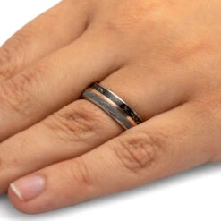 Black Stardust™ Wedding Band With Gold And Meteorite 15 Black Stardust™ Wedding Band With Gold And Meteorite -Johan Jewelry Shop 3766 Handshot