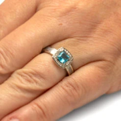 Blue Topaz Halo Engagement Ring -Johan Jewelry Shop 4296Handshot
