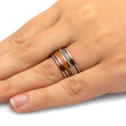 Guitar String Ring With Whiskey Oak And Bloodwood In Titanium 13 Guitar String Ring With Whiskey Oak And Bloodwood In Titanium -Johan Jewelry Shop 4420 Handshot