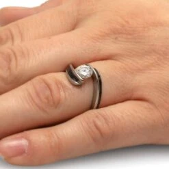 Tension Set Moissanite Engagement Ring With Dinosaur Bone 15 Tension Set Moissanite Engagement Ring With Dinosaur Bone -Johan Jewelry Shop 4519Handshot