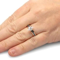 Oval Cut Solitaire Engagement Ring With Dinosaur Bone 13 Oval Cut Solitaire Engagement Ring With Dinosaur Bone -Johan Jewelry Shop 4543RG Handshot 5295f153 148e 40f0 adda 8239044367ed