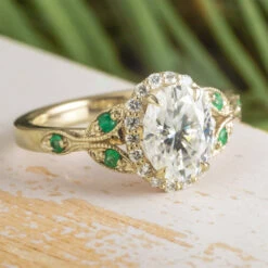 Vintage Style Engagement Ring With Moissanite Halo And Emeralds