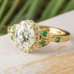 Yellow Gold Halo Engagement Ring With Emerald Accents