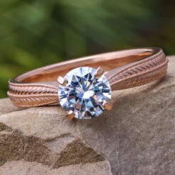 Solitaire Moissanite Engagement Ring In Unique Polished Gold Band