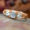 Three Stone Rose Gold Engagement Ring With Meteorite Center Stone 1 Three Stone Rose Gold Engagement Ring With Meteorite Center Stone -Johan Jewelry Shop E3153RGNewArtCropped 2