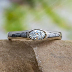 Oval Diamond Engagement Ring With Meteorite Accent