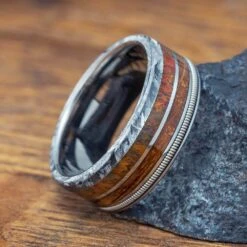 Bass Guitar String Ring With Dinosaur Bone, Meteorite, And Whiskey Wood 11 Bass Guitar String Ring With Dinosaur Bone, Meteorite, And Whiskey Wood -Johan Jewelry Shop E4947ArtCropped 2