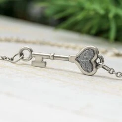Silver And Meteorite Key Bracelet With Heart Inlay