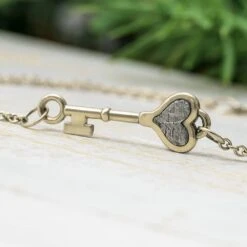 Tiny Key Bracelet With Meteorite Heart Inlay 11 Tiny Key Bracelet With Meteorite Heart Inlay -Johan Jewelry Shop E5153WGArtCropped 3