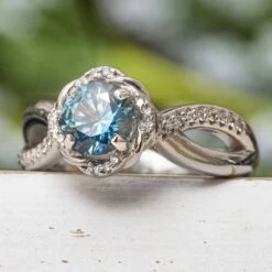 Blue Topaz Engagement Ring With Deer Antler Inlay