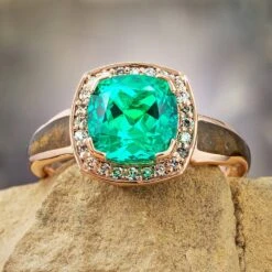 Emerald Halo Engagement Ring With Dinosaur Bone