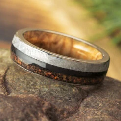 Custom Fossil And Meteorite Wedding Band With Wood Sleeve