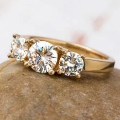 2 Carat TW Charles & Colvard Moissanite Three Stone Ring In Yellow Gold