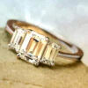 Charles & Colvard Moissanite Emerald Cut Three Stone Ring In White Gold