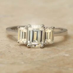 Charles & Colvard Moissanite Emerald Cut Three Stone Ring In White Gold -Johan Jewelry Shop E612941ArtCropped 1 3
