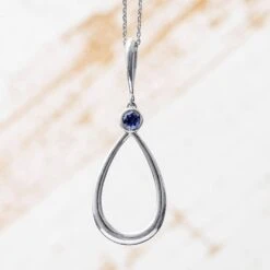 Round Iolite Teardrop Pendant In Sterling Silver