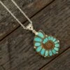 Ammonite Fossil With Turquoise Inlays Set In Silver, In Stock -Johan Jewelry Shop ERSSB0164Art 1