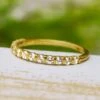 Channel Set Half Eternity Band With Round Cut Diamonds 1 Channel Set Half Eternity Band With Round Cut Diamonds -Johan Jewelry Shop EST123600YGArtCropped 2