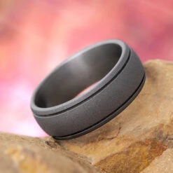 Round Wedding Ring With Sandblasted Titanium And Grooved Pinstripes
