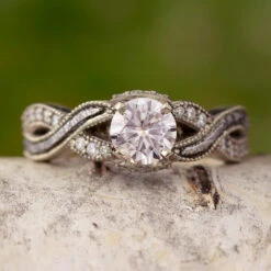 Moissanite Engagement Ring With A Twisted Meteorite And Diamond Shank
