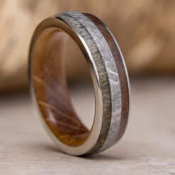 Meteorite And Dinosaur Bone Wedding Band With Whiskey Wood Sleeve 15 Meteorite And Dinosaur Bone Wedding Band With Whiskey Wood Sleeve -Johan Jewelry Shop E 4048 Art Cropped 4