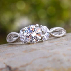 Round Cut Moissanite And Diamond Engagement Ring